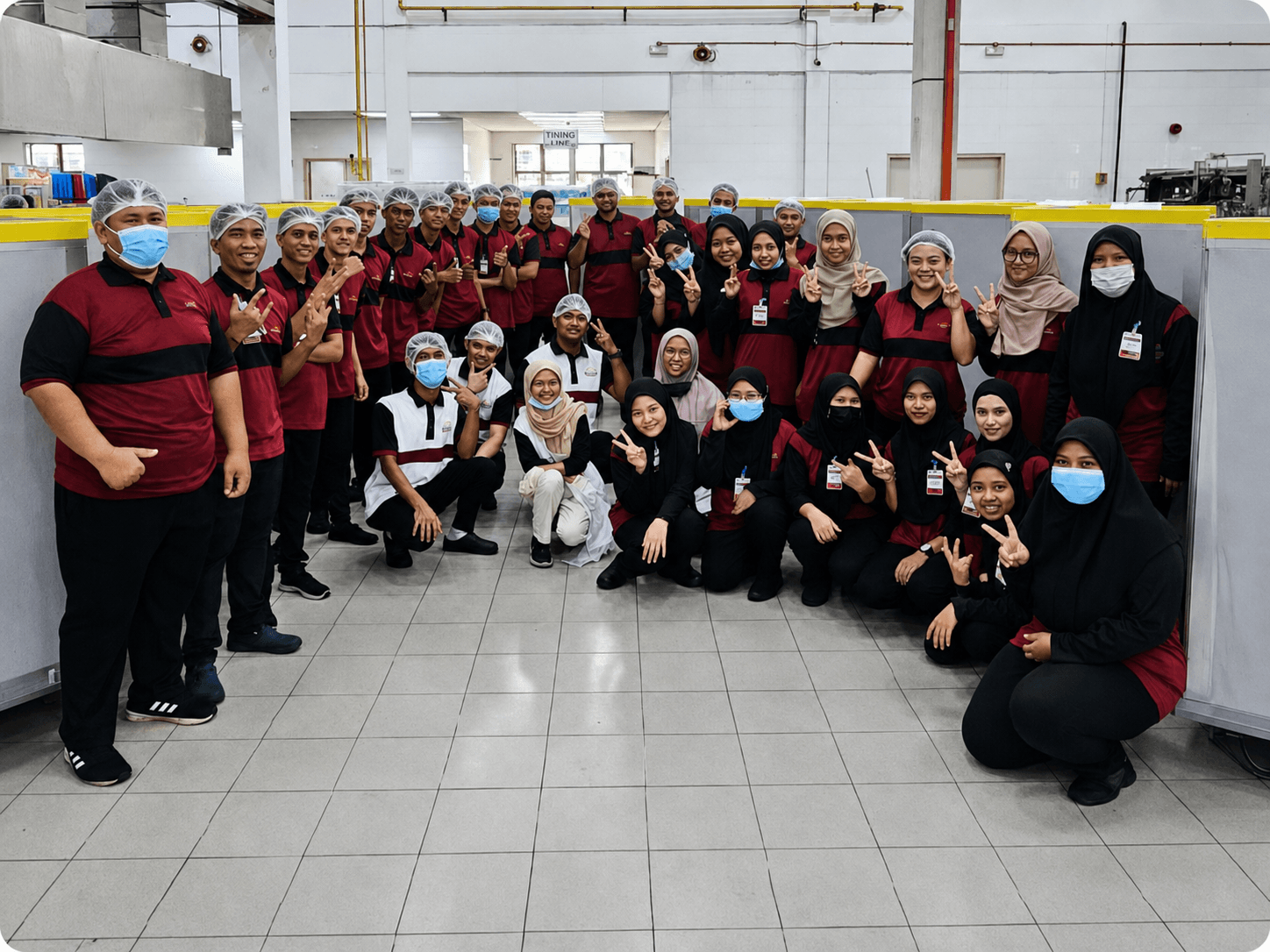 The Irkaz Gourmet team celebrating together at the production facility